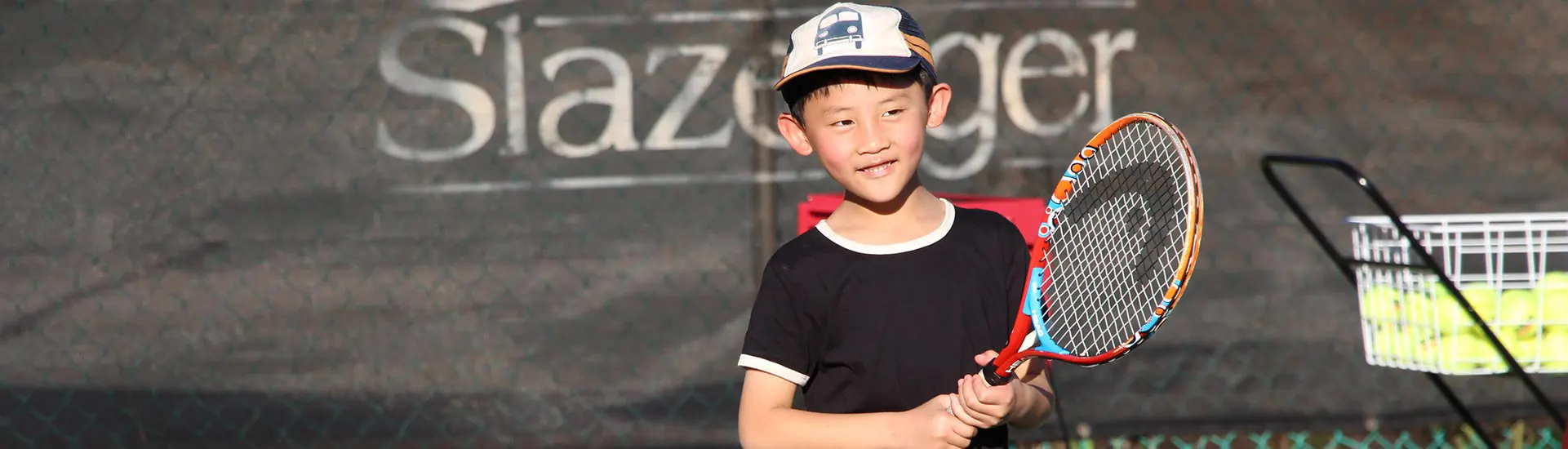 Two young tennis players having fun